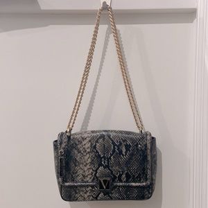 Vegan snakeskin style purse. Victoria Secrets. Comes with small lipstick mirror